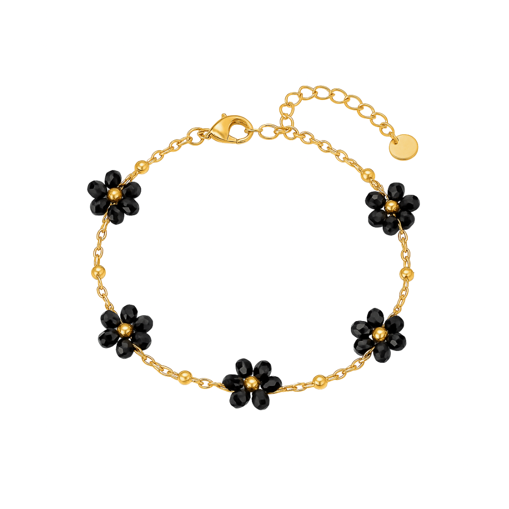 Goldenes Armband mit kleinen schwarzen Blumenanhängern