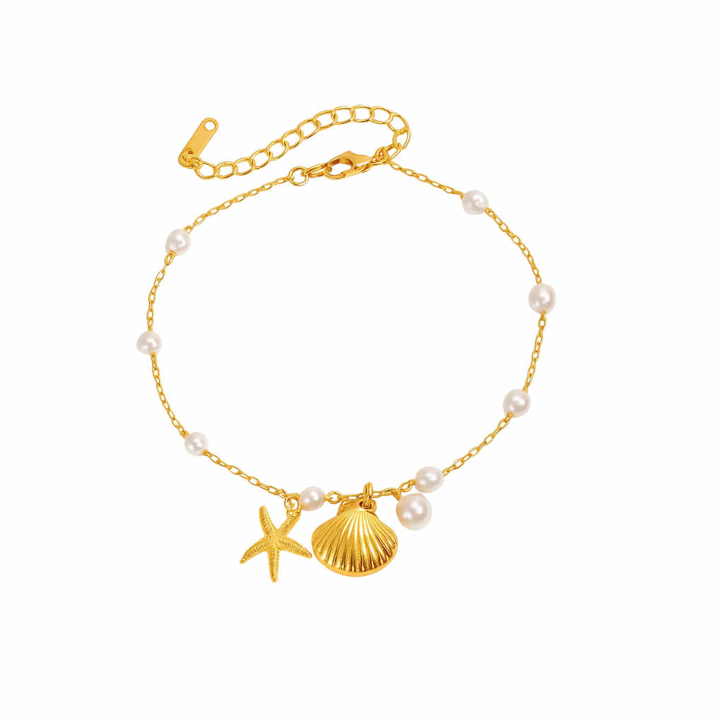 Goldene fußkette mit muscheln und perlen